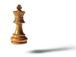 Golden king chess piece floating mid air against white background for strategic design concepts photo