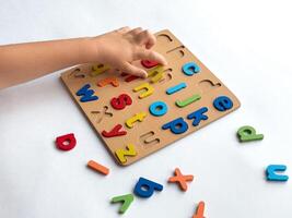 Colorful alphabet puzzle for early childhood learning and development photo