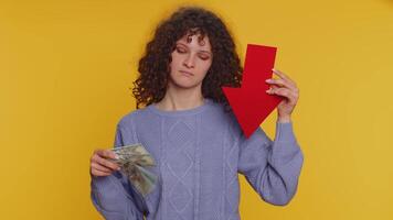 Upset woman showing red arrow pointing down, concept of downgrade bankruptcy money dollar fail, fall video