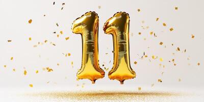 Celebrate with reflective golden balloon number 11 for special occasion decorations photo
