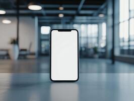 Sleek modern smartphone with blank screen in office environment photo