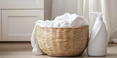 Minimalist laundry setup with natural basket and detergent container for home organization and clean living photo