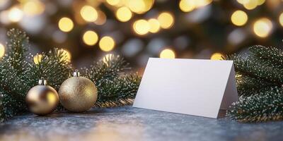 Festive christmas greeting card mockup with golden ornaments and pine branches for holiday design photo