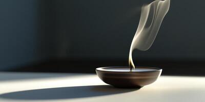 Burnout concept with recently extinguished candle and rising smoke photo
