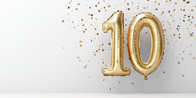 Golden metallic balloon number 10 with confetti for celebrations and anniversaries photo