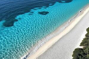 Crystal-clear turquoise waters meet pristine white sand in this tranquil beach haven photo