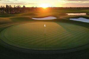 Golden Sunset Over a Pristine Golf Green photo