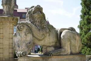 Walbrzych, Poland - August 12th, 2024 - Statue of a lion at Ksiaz Castle photo