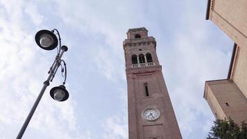 Ancient clock tower with clouds in the background video