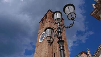 Ancient clock tower with clouds in the background video