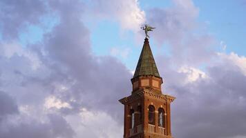Ancient bell tower with clouds in the background video