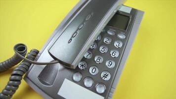 nervous person throws and tapping handset on phone closeup video