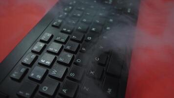 wireless computer keyboard and steam clouds on red closeup video