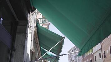 Shutters of fabric of an open shop video
