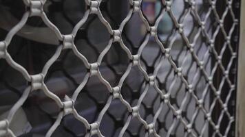 An intricate metallic mesh pattern designed specifically for security video