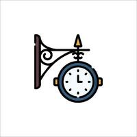 A clock hanging from a wall with a sign on it vector