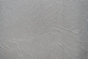 The aluminum silver stripe had a seamless background of a random line pattern, giving it a dynamic and eye-catching appearance. The silver color added to the sleek and modern look. photo