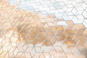 Shiny mirror cut in a cube shape for decorating wall and floor, laying mirror tile in 3d cube geometric pattern. photo