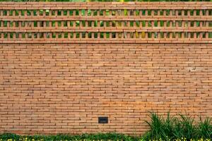 The new pattern of hole brick wall arrangement art with modern and vintage combination style for creative wall background design. photo