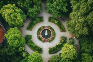 Aerial view of a circular garden with fountain. photo