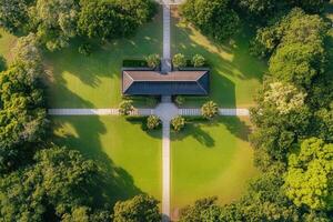 Aerial view of a park with a building in the center. photo