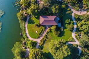 Aerial view of lakeside house and garden. photo