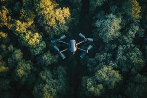 Drone flying over lush green forest canopy. photo