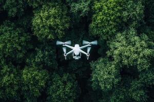 Aerial view of drone flying over lush green forest canopy. photo
