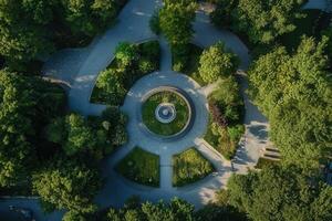 Aerial view of a circular park with fountain. photo