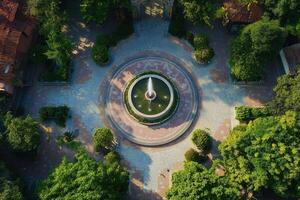 Aerial view of a tranquil courtyard with a central fountain. photo