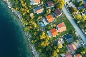 Aerial view of lakeside houses. photo