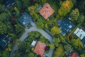 Aerial view of a residential neighborhood nestled amongst lush greenery. photo