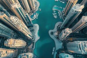 Aerial view of skyscrapers surrounding a marina. photo