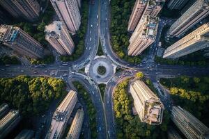 Aerial view of city intersection with skyscrapers and green spaces photo