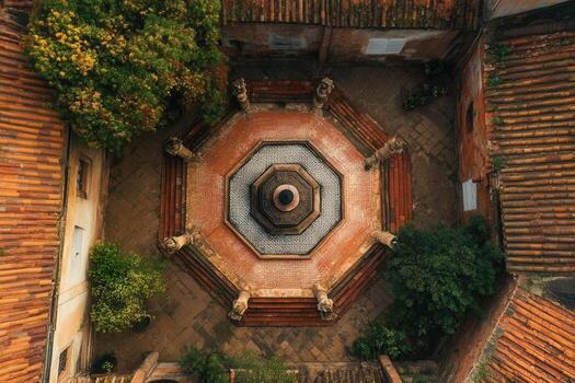 Aerial view of octagonal fountain in courtyard. photo