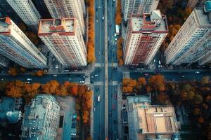 Aerial view of city intersection with autumn foliage. photo