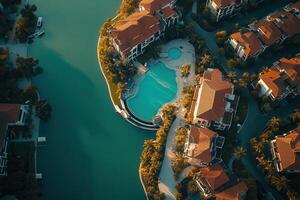Aerial view of luxury waterfront homes with pool. photo