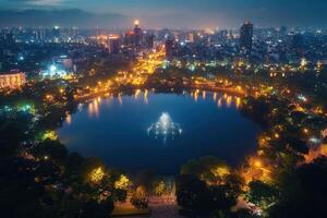 Night cityscape with illuminated lake and park. photo
