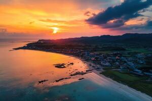 Vibrant sunset over coastal town. photo