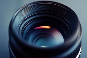 Close-up of a camera lens, showcasing its intricate details and reflective surface. photo