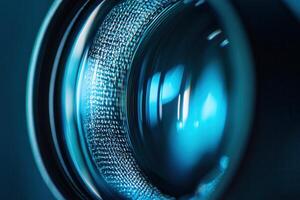 Close-up of a camera lens with blue light reflection. photo