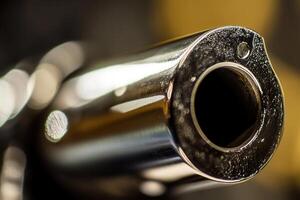 Close-up of a gun barrel, showing detail and texture. photo