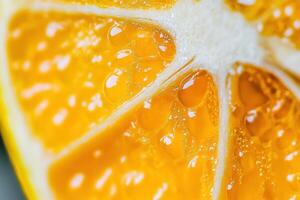Close-up of a juicy orange citrus fruit slice, showing texture and pulp. photo