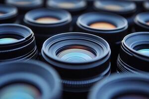 Close-up of multiple camera lenses arranged in rows. photo