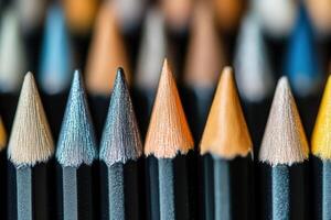 Close-up of sharpened colored pencils arranged in rows, showcasing their vibrant hues and textures. photo
