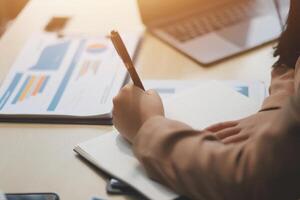 business documents businessman check legal document review Prepare documents or analysis reports, tax items, accounting documents, data contracts, office partner agreements. photo