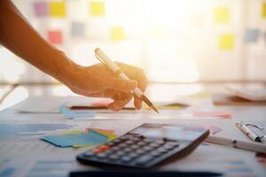 businessman working data document graph chart report marketing research development planning management strategy analysis financial accounting. Business office concept. photo