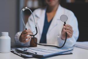 picture of doctor hand with stethoscope listening something photo