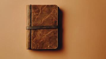 A Classic Leather Bound Journal Perfect for Note Taking and Creative Writing in Various Settings photo
