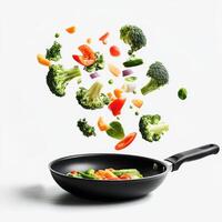 Flipping veggies with pan studio isolated photo